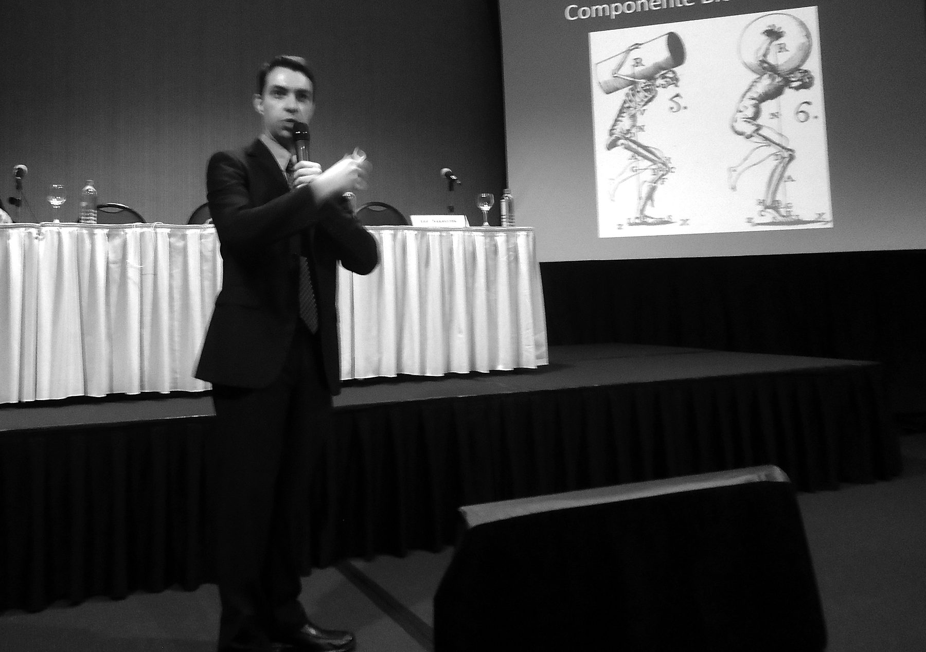 Joe Rosario lecturing on biomechanics at a medical conference